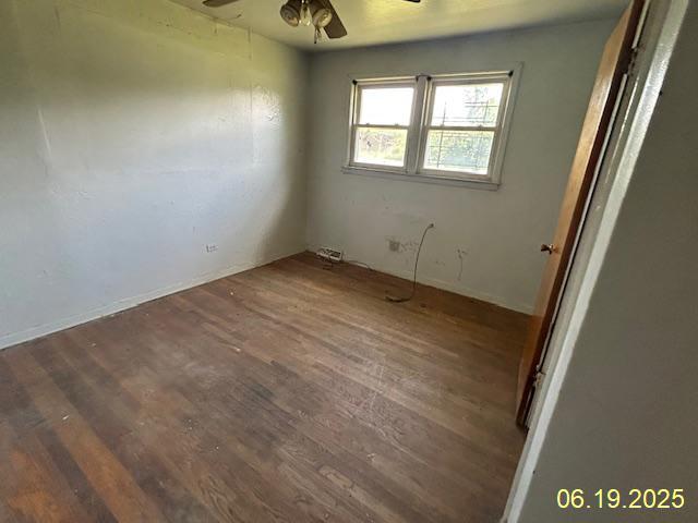 14839 Cooper Ave, Harvey, IL 60426 - spare room with a ceiling fan and wood finished floors