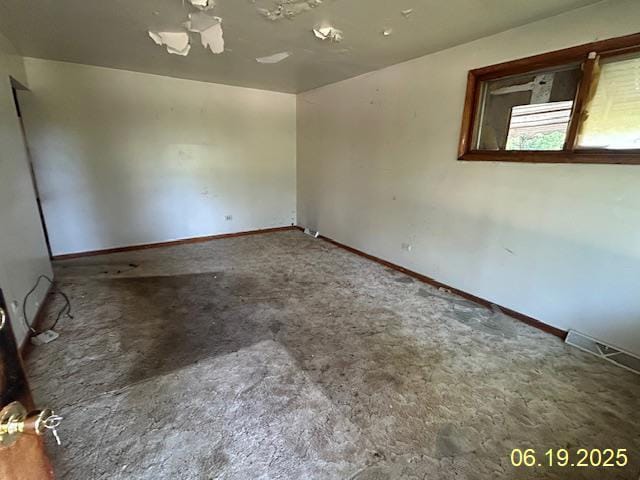 14839 Cooper Ave, Harvey, IL 60426 - carpeted spare room with baseboards