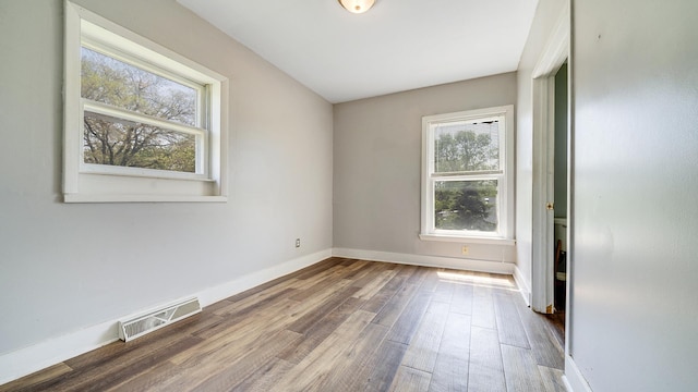 630 Willett Ave, Dixon, IL 61021 - unfurnished room featuring wood finished floors and baseboards
