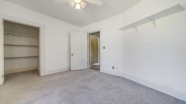630 Willett Ave, Dixon, IL 61021 - unfurnished bedroom featuring carpet, baseboards, ceiling fan, and a closet