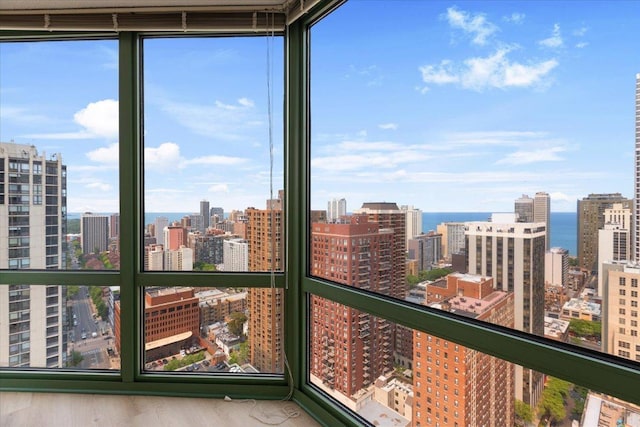111 W Maple St Unit 3001, Chicago, IL 60610 - unfurnished sunroom featuring a city view, plenty of natural light, and a water view