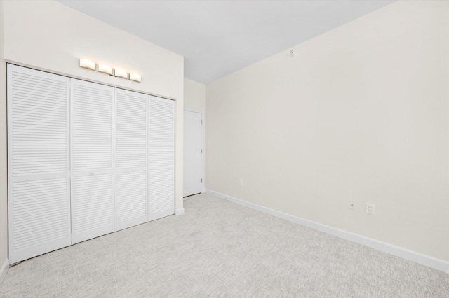 233 E 13th St Unit 2209, Chicago, IL 60605 - unfurnished bedroom with carpet, baseboards, and a closet