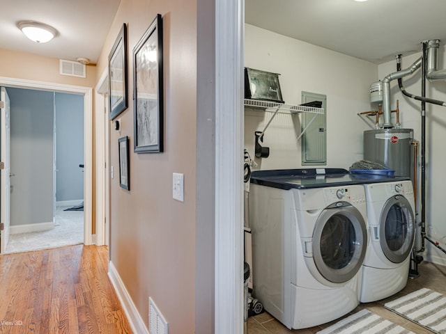 17200 Oak Park Ave Unit R-206, Tinley Park, IL 60477 - laundry area with electric panel, laundry area, visible vents, washer and dryer, and light wood-style floors