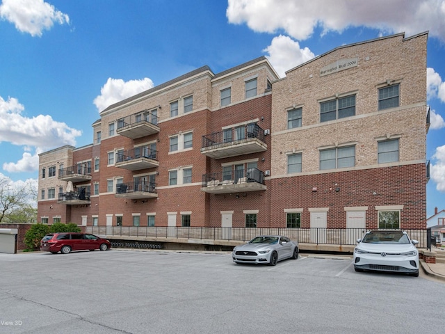17200 Oak Park Ave Unit R-206, Tinley Park, IL 60477 - view of building exterior with uncovered parking