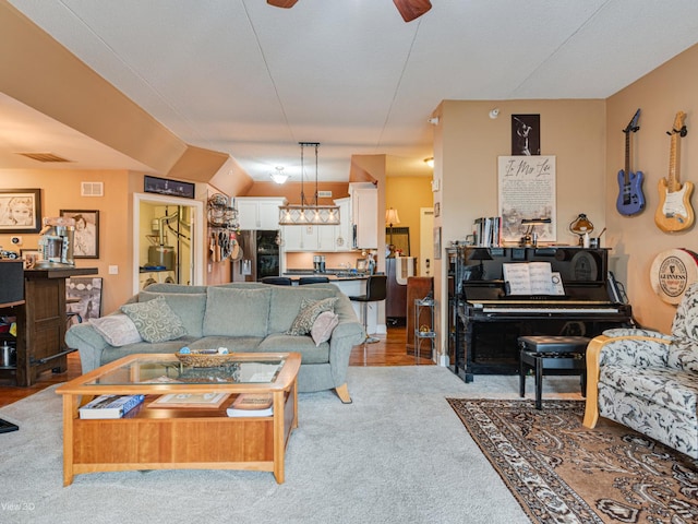 17200 Oak Park Ave Unit R-206, Tinley Park, IL 60477 - living area featuring light carpet, visible vents, and ceiling fan