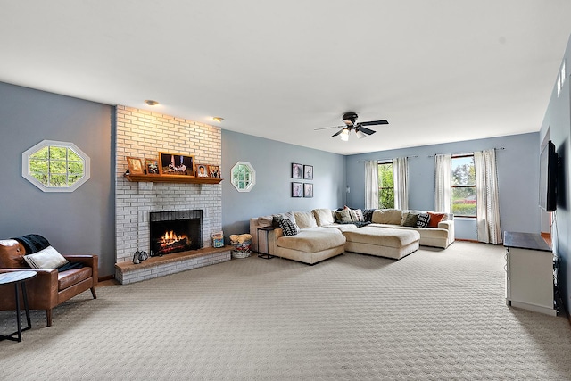 12318 W Donegal Ln, New Lenox, IL 60451 - living area featuring light colored carpet, a ceiling fan, a brick fireplace, and baseboards