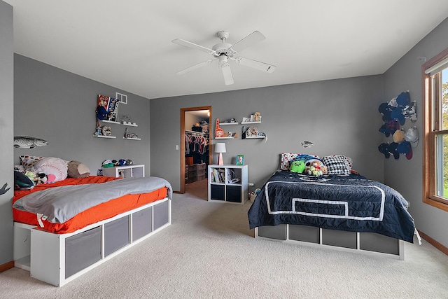 12318 W Donegal Ln, New Lenox, IL 60451 - bedroom with carpet floors, a walk in closet, a ceiling fan, and baseboards