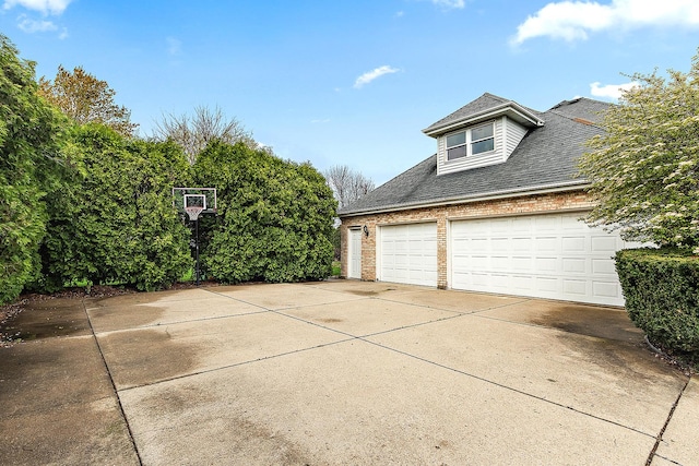 12318 W Donegal Ln, New Lenox, IL 60451 - view of side of property featuring a garage and brick siding