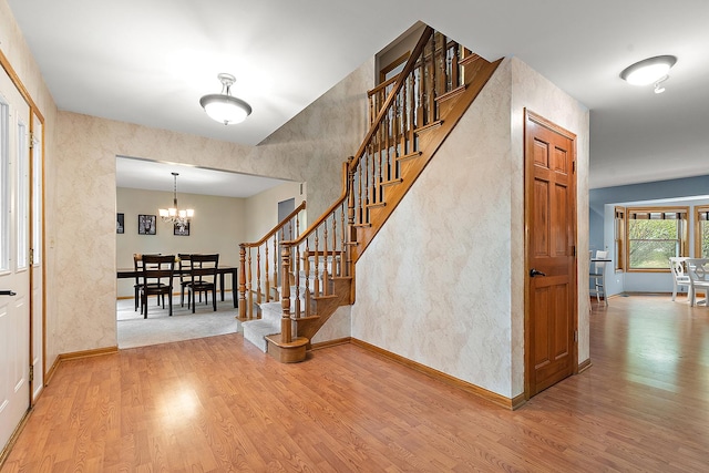 12318 W Donegal Ln, New Lenox, IL 60451 - entryway with wood finished floors, stairs, and baseboards
