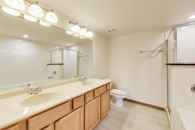 6560 W Diversey Ave Unit 412D, Chicago, IL 60707 - full bath with an enclosed shower, a tub, double vanity, toilet, and baseboards