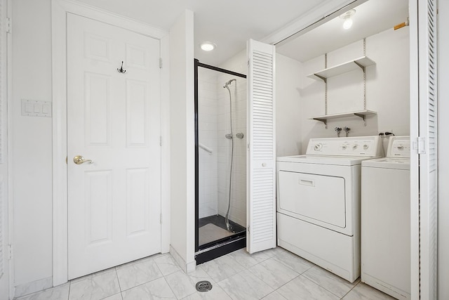 laundry room featuring light marble finish flooring, independent washer and dryer, and recessed lighting