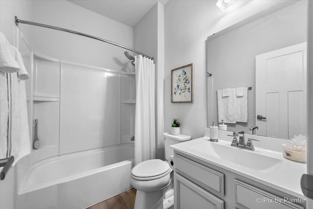 3610 Reddington Cir, Elgin, IL 60124 - full bath featuring toilet, vanity, wood finished floors, and shower / bathtub combination with curtain