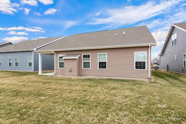 3610 Reddington Cir, Elgin, IL 60124 - rear view of house featuring a lawn