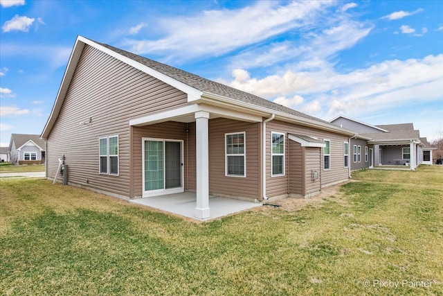 3610 Reddington Cir, Elgin, IL 60124 - back of property with a patio and a lawn
