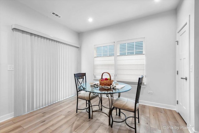 3610 Reddington Cir, Elgin, IL 60124 - dining room with baseboards, recessed lighting, light wood-style floors, and visible vents