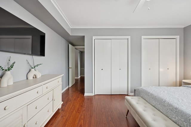 6259 N NW Hwy Unit 3D, Chicago, IL 60631 - bedroom with ornamental molding, multiple closets, dark wood finished floors, and visible vents
