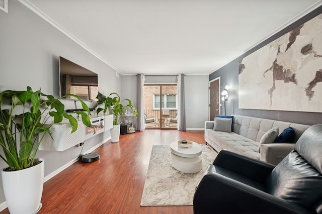 6259 N NW Hwy Unit 3D, Chicago, IL 60631 - living area with crown molding, visible vents, wood finished floors, and baseboards