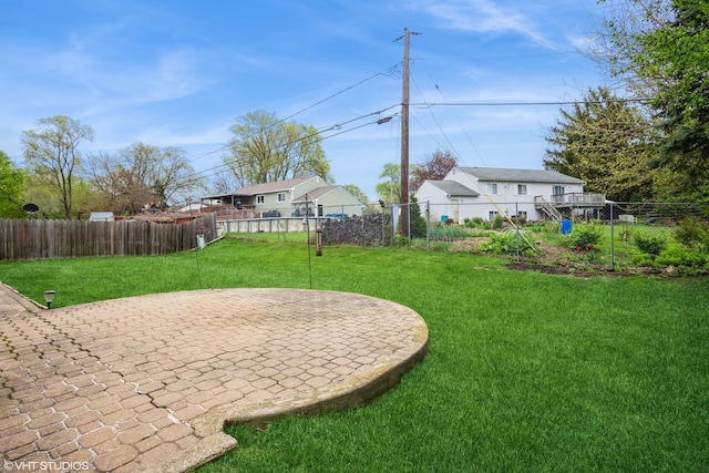 1319 President St, Glendale Heights, IL 60139 - view of yard with a fenced backyard and a patio area