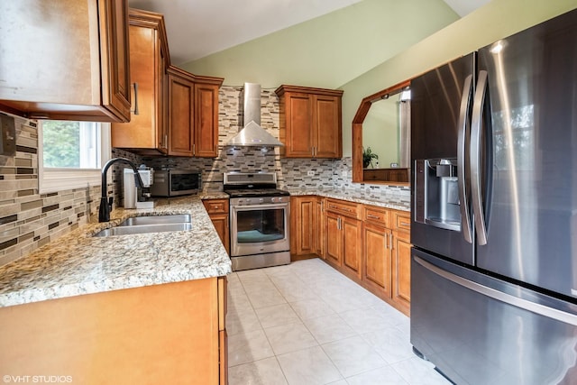 1319 President St, Glendale Heights, IL 60139 - kitchen featuring a sink, wall chimney exhaust hood, vaulted ceiling, decorative backsplash, and appliances with stainless steel finishes