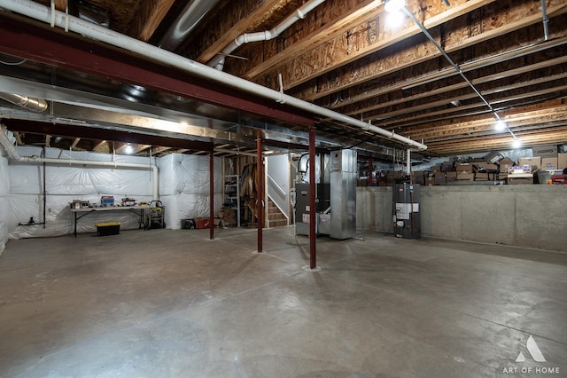 1007 Biltmore Dr, Elgin, IL 60120 - unfinished basement with heating unit, stairway, and gas water heater
