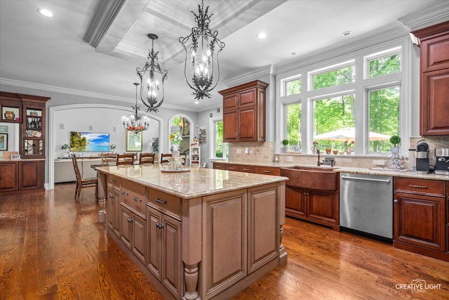 4779 Lees Ct, Oswego, IL 60543 - kitchen featuring dishwasher, a sink, a chandelier, tasteful backsplash, and hanging light fixtures