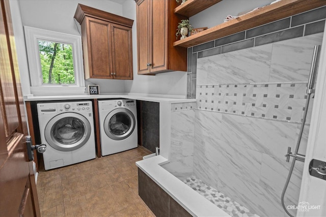 4779 Lees Ct, Oswego, IL 60543 - laundry room featuring independent washer and dryer and cabinet space