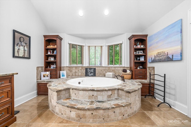 4779 Lees Ct, Oswego, IL 60543 - bathroom with baseboards, a garden tub, vanity, vaulted ceiling, and recessed lighting