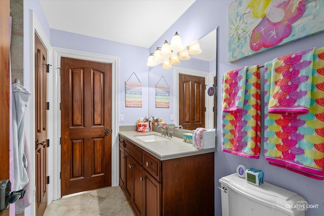 4779 Lees Ct, Oswego, IL 60543 - bathroom featuring a chandelier, toilet, and vanity