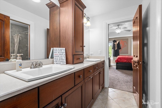 4779 Lees Ct, Oswego, IL 60543 - full bath featuring double vanity, ceiling fan, tile patterned flooring, a shower with shower curtain, and ensuite bathroom