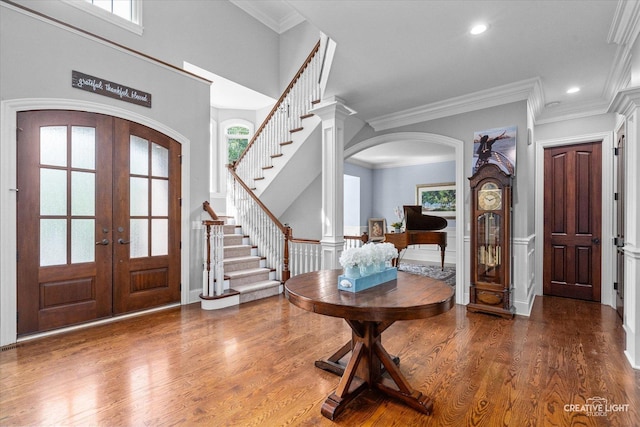 4779 Lees Ct, Oswego, IL 60543 - entryway with french doors, arched walkways, stairway, wood finished floors, and plenty of natural light