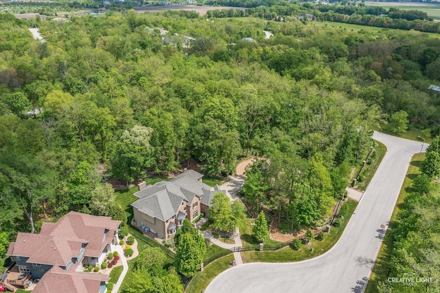 4779 Lees Ct, Oswego, IL 60543 - aerial view of property and surrounding area featuring a heavily wooded area
