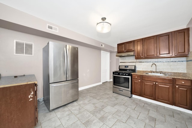 2720 S Christiana Ave, Chicago, IL 60623 - kitchen featuring a sink, stainless steel appliances, under cabinet range hood, and visible vents
