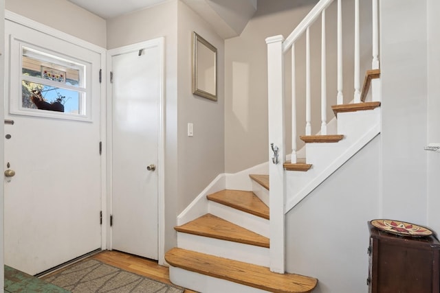 2815 W Jarvis Ave, Chicago, IL 60645 - entrance foyer featuring light wood-type flooring and stairway
