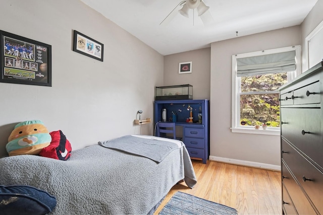 2815 W Jarvis Ave, Chicago, IL 60645 - bedroom featuring light wood-type flooring, baseboards, and ceiling fan