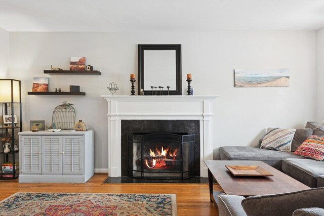 2815 W Jarvis Ave, Chicago, IL 60645 - living room with a premium fireplace and wood finished floors