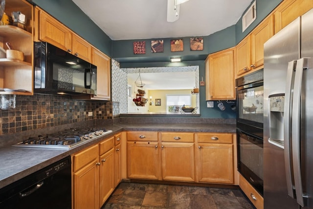 2815 W Jarvis Ave, Chicago, IL 60645 - kitchen with black appliances, backsplash, dark countertops, and stone finish floors