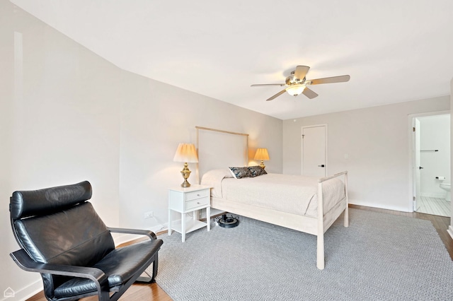 711 S River Rd S Unit 309, Des Plaines, IL 60016 - bedroom featuring wood finished floors, baseboards, and ceiling fan