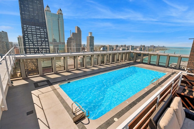 260 E Chestnut St Unit 1706, Chicago, IL 60611 - community pool featuring a view of skyline and a water view