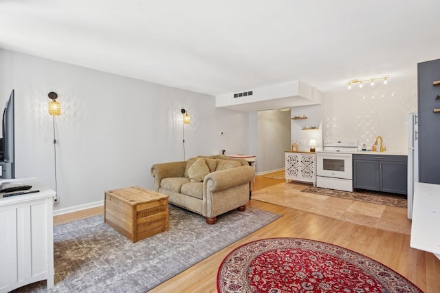 260 E Chestnut St Unit 1706, Chicago, IL 60611 - living area with light wood-type flooring