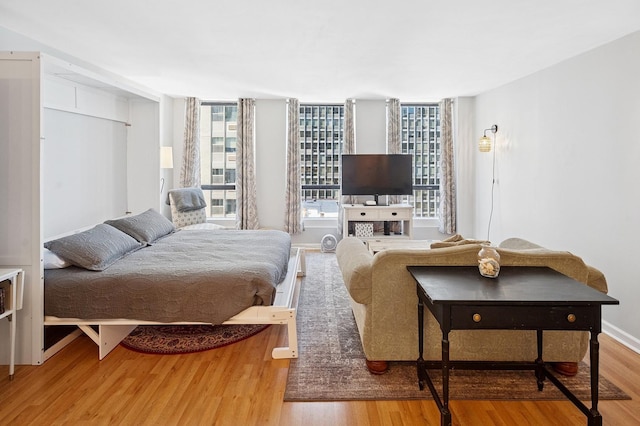 260 E Chestnut St Unit 1706, Chicago, IL 60611 - bedroom featuring wood finished floors
