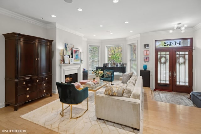 1442 W Cuyler Ave, Chicago, IL 60613 - living room with crown molding, light wood-type flooring, a glass covered fireplace, and recessed lighting