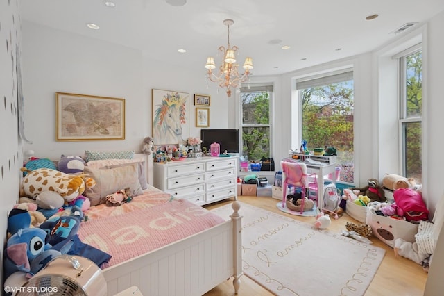 1442 W Cuyler Ave, Chicago, IL 60613 - bedroom featuring a chandelier, visible vents, wood finished floors, and recessed lighting