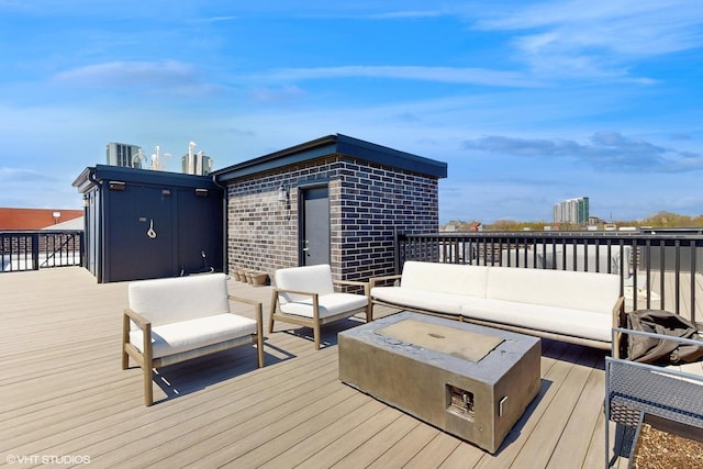 wooden terrace featuring an outdoor hangout area