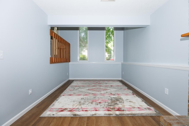 107 Regal Dr, Normal, IL 61761 - spare room featuring wood finished floors and baseboards