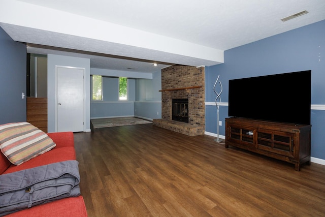 107 Regal Dr, Normal, IL 61761 - unfurnished living room with wood finished floors, a fireplace, and stairs
