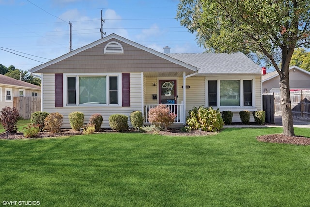 view of front of property featuring a porch and roof with shingles