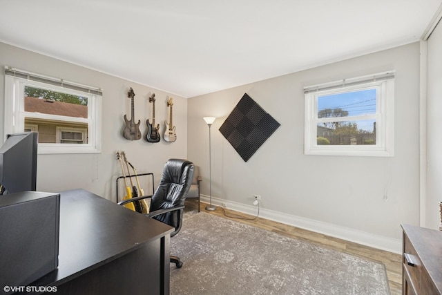office featuring wood finished floors and baseboards