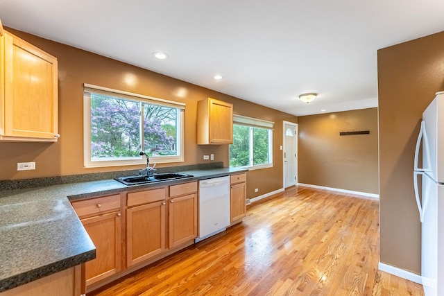 204 N Rohlwing Rd, Palatine, IL 60074 - kitchen with white appliances, a sink, light wood-style floors, dark countertops, and recessed lighting