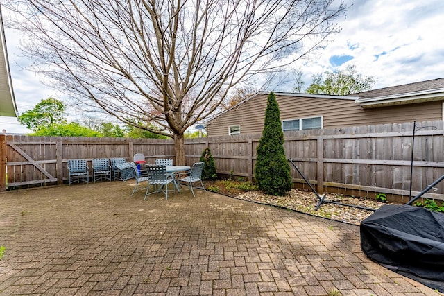 204 N Rohlwing Rd, Palatine, IL 60074 - view of patio featuring outdoor dining space and a fenced backyard