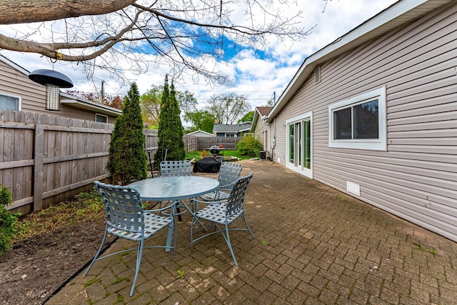 204 N Rohlwing Rd, Palatine, IL 60074 - view of patio with a fenced backyard and outdoor dining space